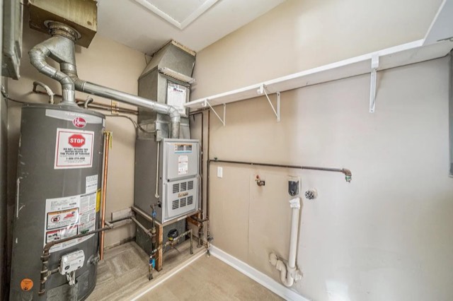 Laundry: Missing GFCI, Drain Pan Missing, No Expansion tank: photo the finding was judged from