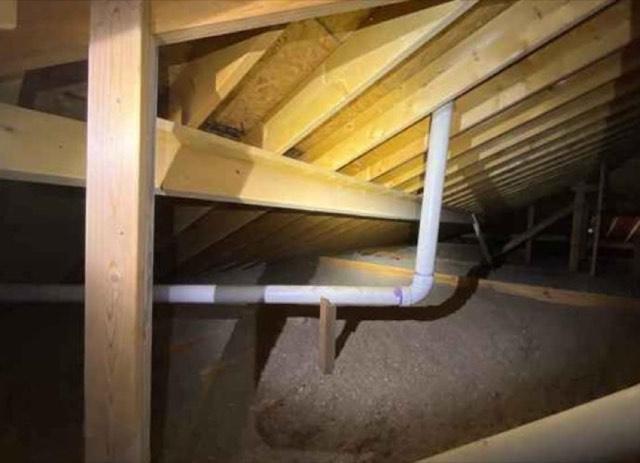 Attic: Purlin Bracing Inadequate, PVC Pipe Not Supported: photo the finding was judged from